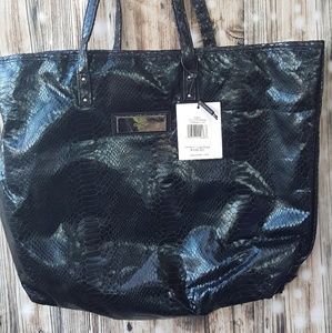 An oversized tote Calvin Klein new the price tag s